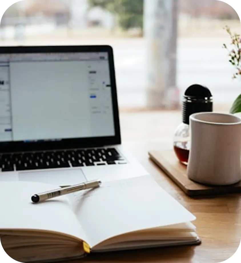 Laptop on a wooden table